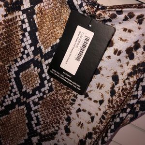 LONGER LEOPARD DRESS. PRETTY LITTLE THING.